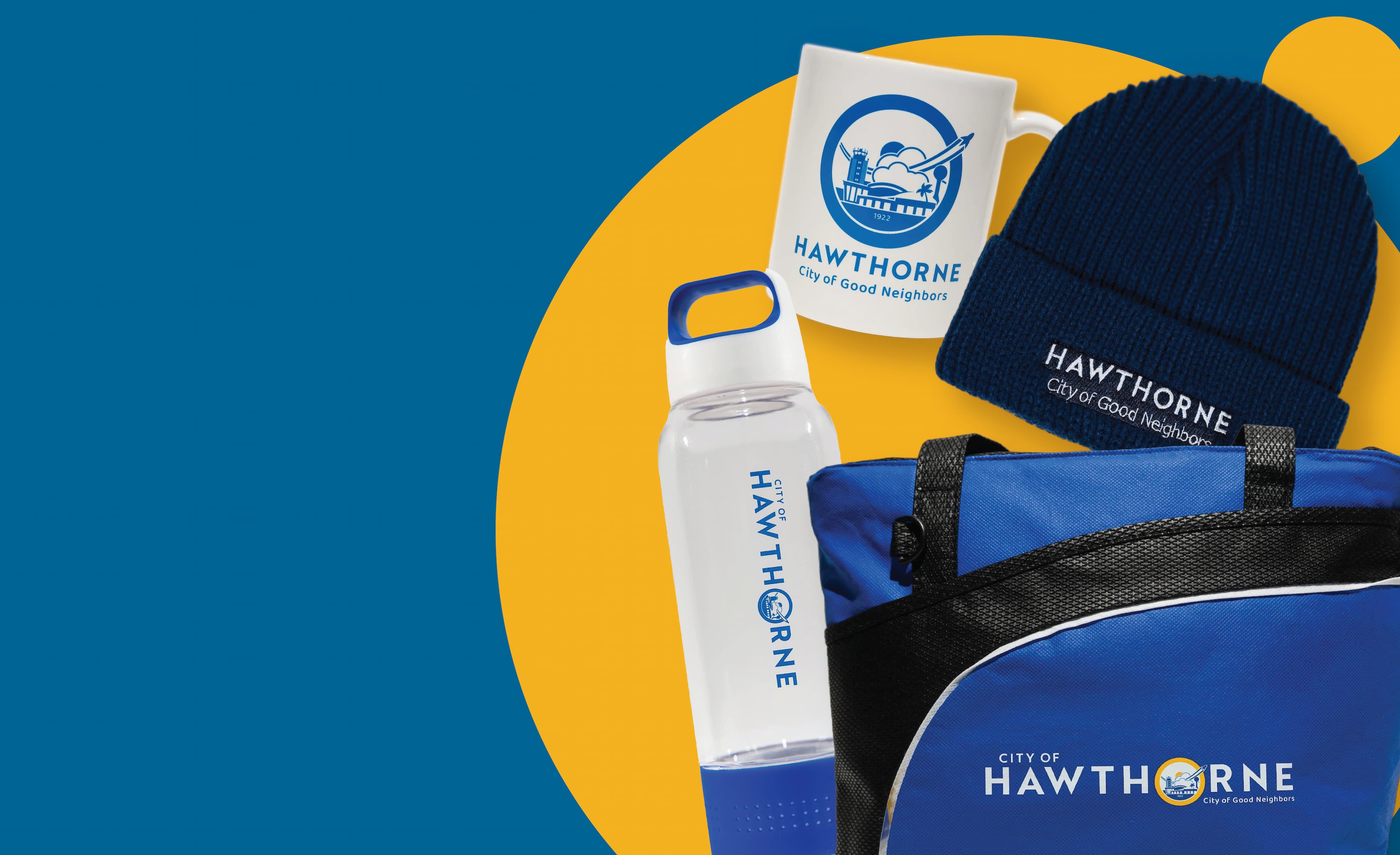 Collection of City of Hawthorne branded items including a water bottle, mug, and backpack on a blue and yellow background.
